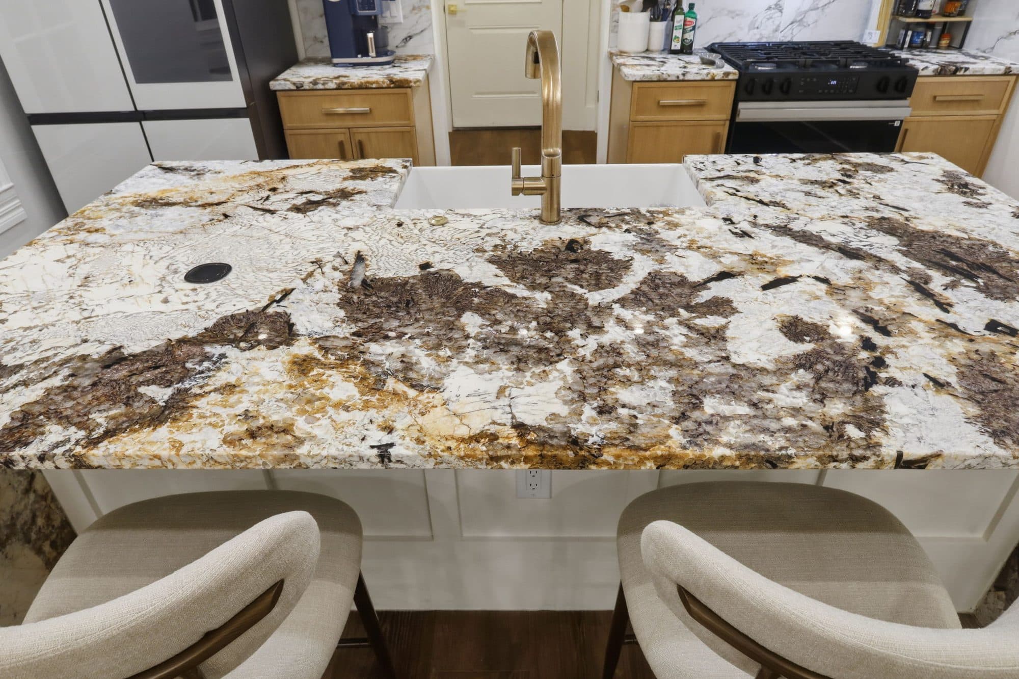 Close view of the waterfall granite island in the 917 Burnet Street kitchen