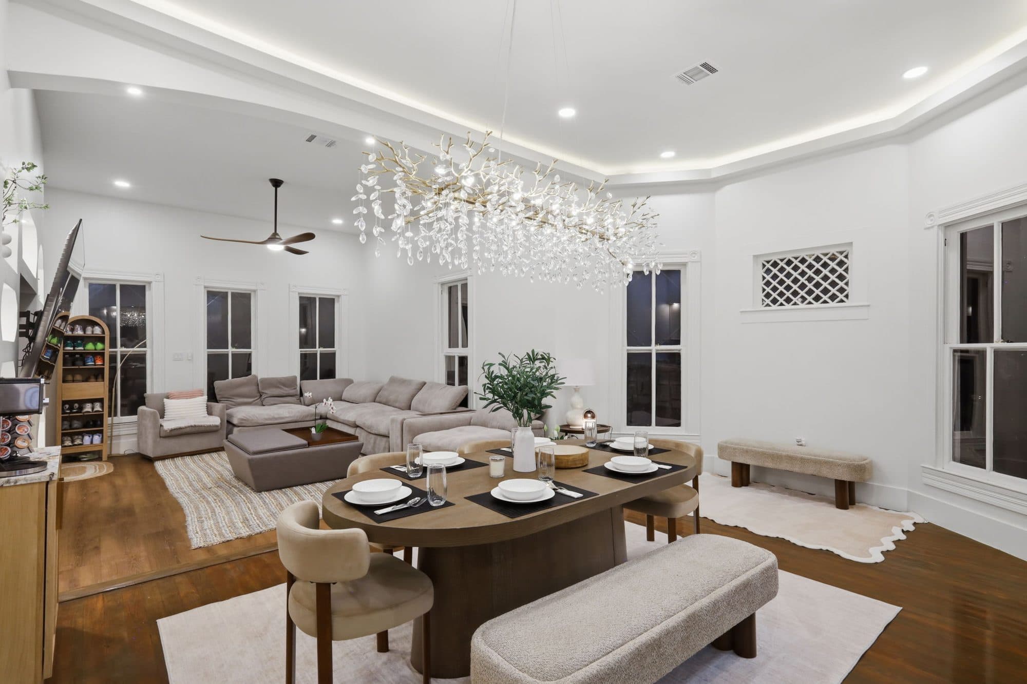 Open plan living and dining area with chandelier at 917 Burnet Street