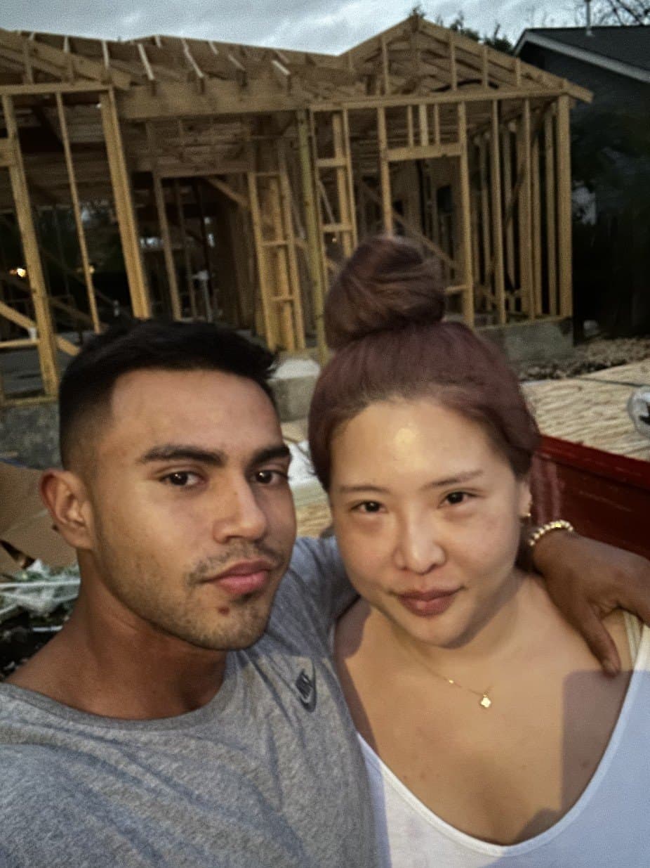 Christian Hernandez and Mi Hee Yoo of Luxterra Builders on site at a house under framing in San Antonio