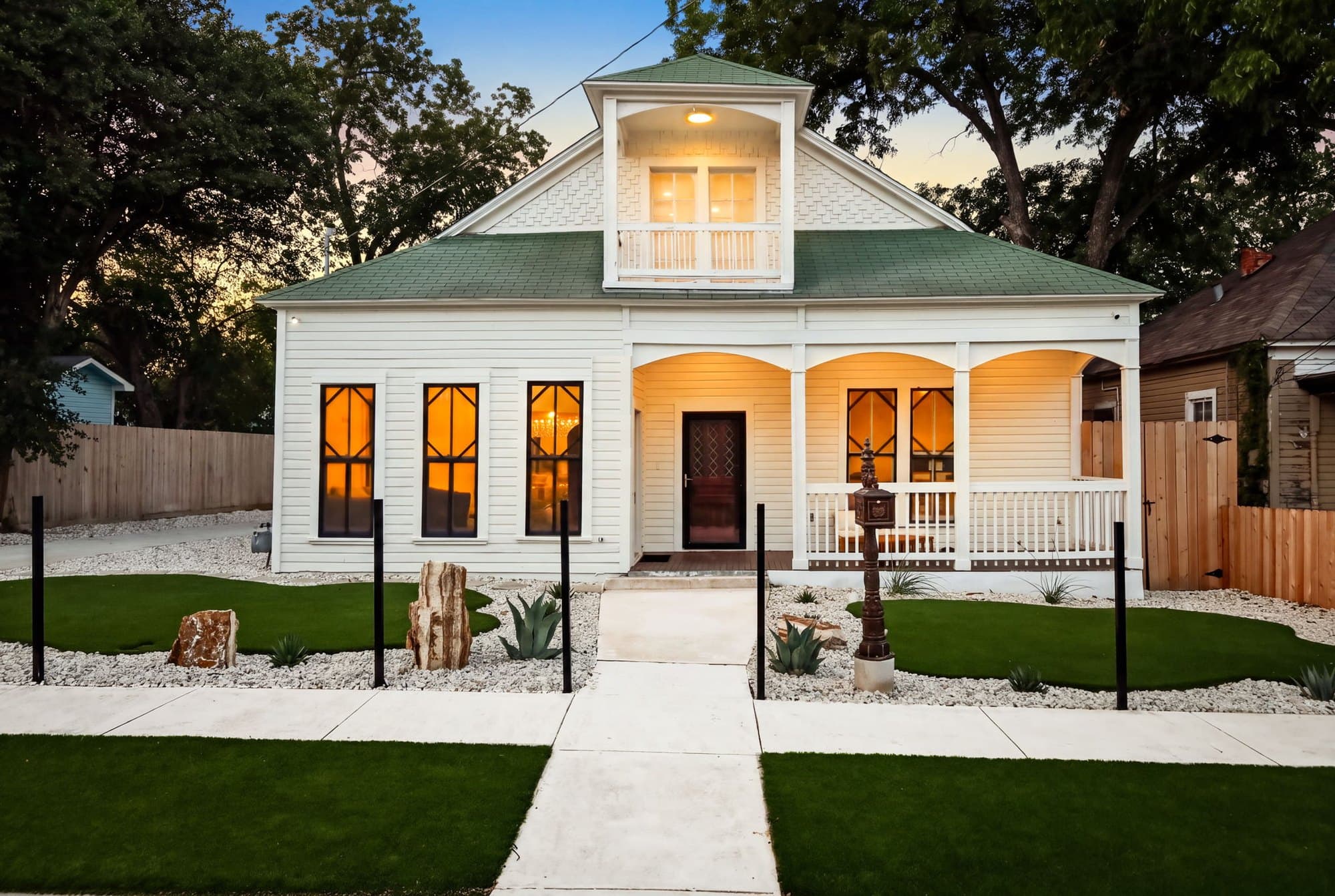 Dignowity Hill historic home renovation at twilight, San Antonio
